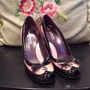 New Pink and black spectator pumps